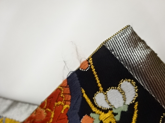  作家物　雪輪に花々・蝶・竹模様織出し袋帯